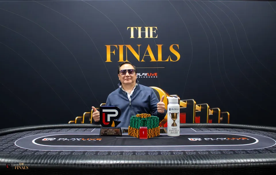 Michael Tchong with the Mini Main Event trophy